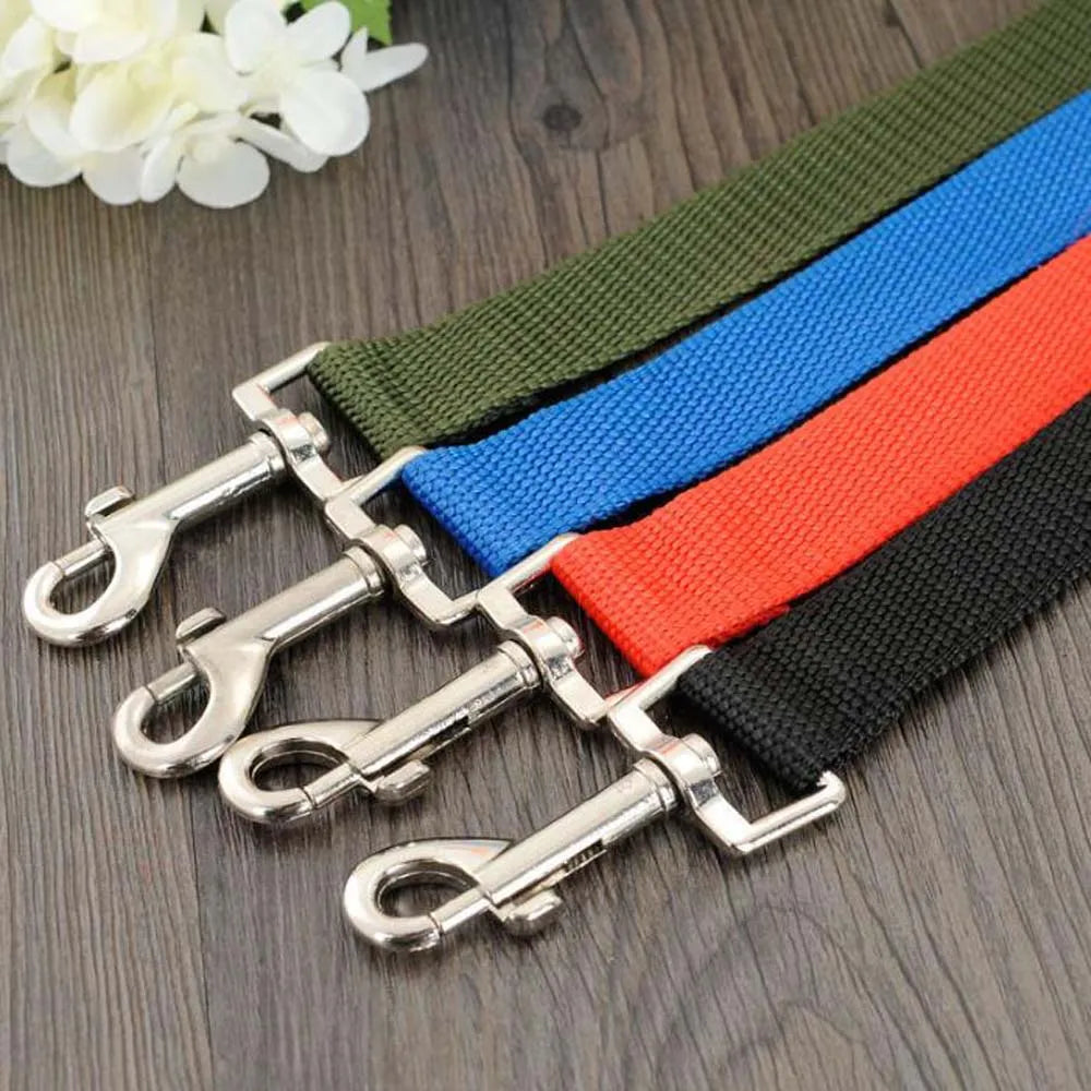 Dog Car Safety Belt for Small & Medium Pets in various colors with metal clips, ensuring safety for your pet on car rides.